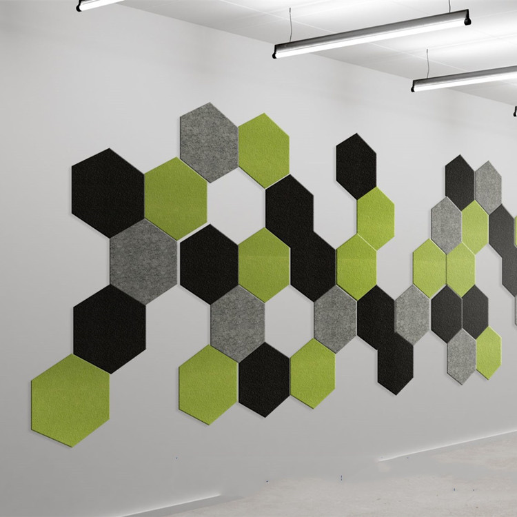 Green and grey acoustic tiles make an interesting pattern